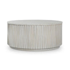Table basse ronde avec rangement intégré