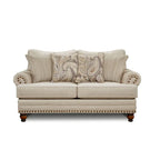 Causeuse de transition beige avec garniture cloutée