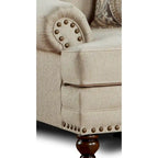 Causeuse de transition beige avec garniture cloutée