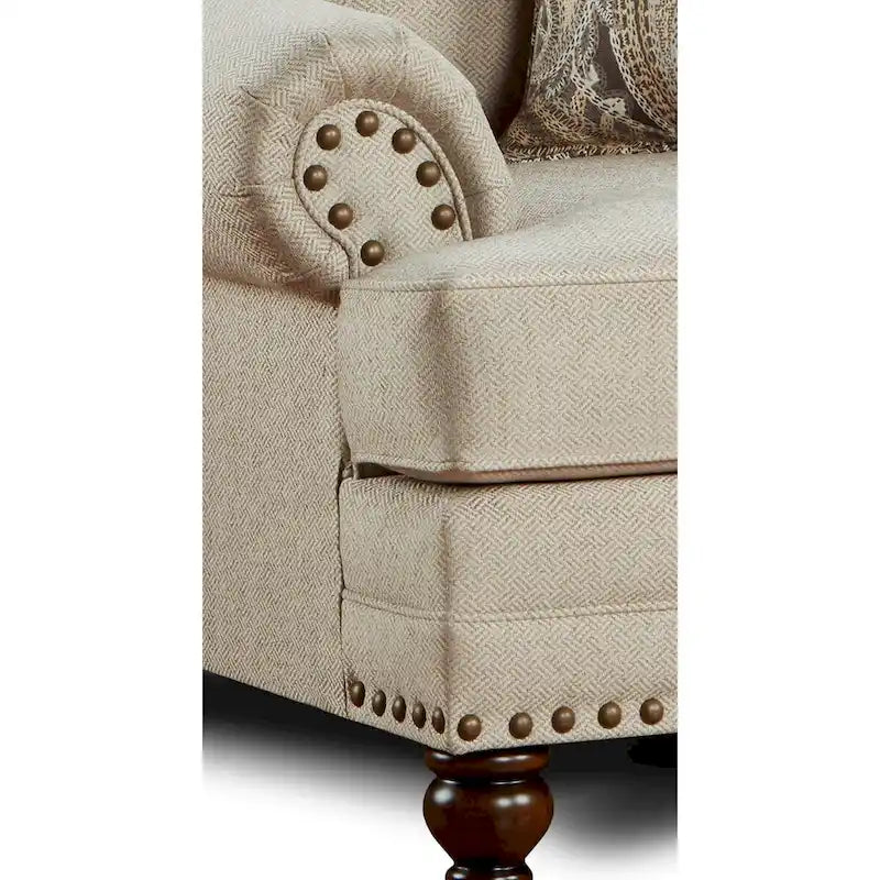 Causeuse de transition beige avec garniture cloutée